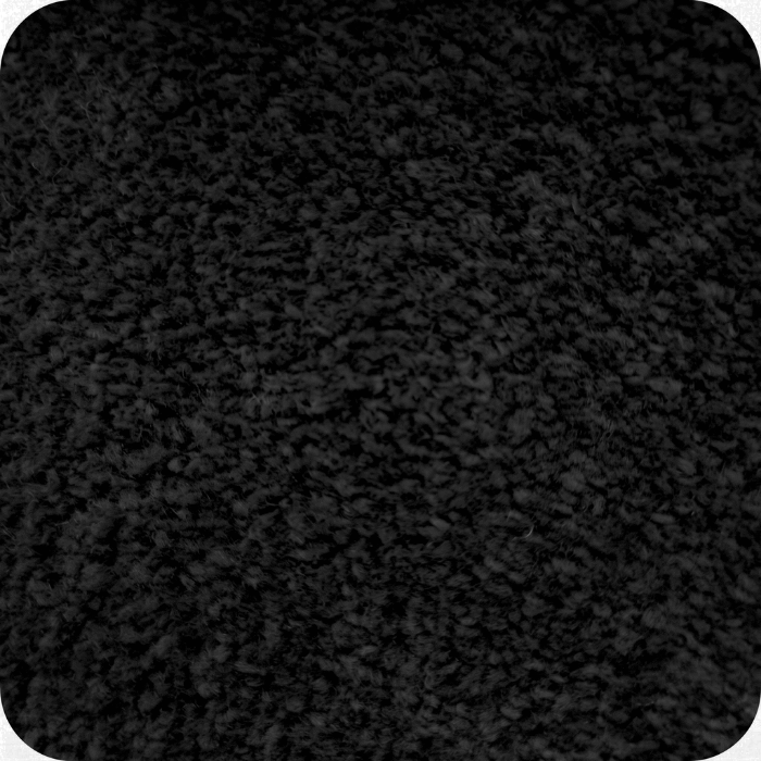 Black textured carpet or fabric surface with dense woven fibers and subtle light variations
