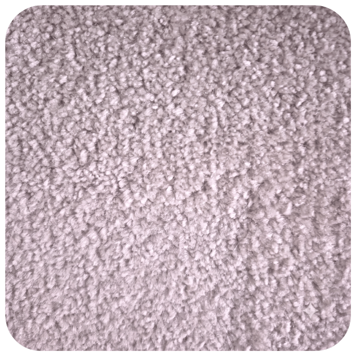 Close-up of gray textured carpet fibers showing soft, plush surface material