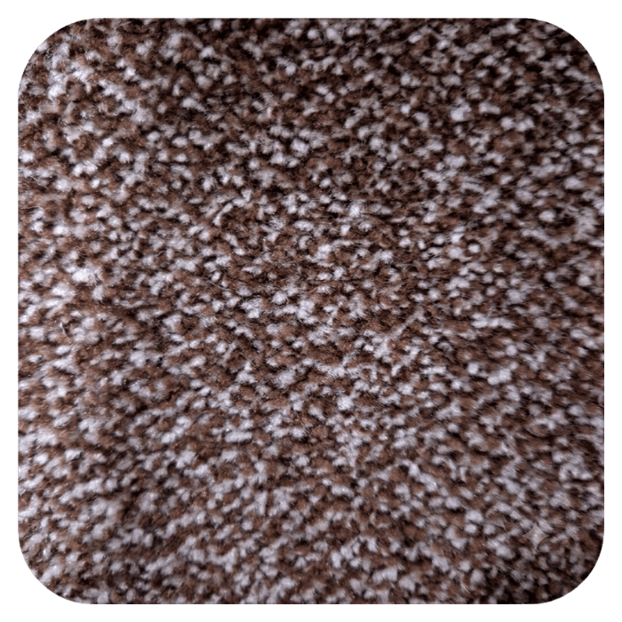Close-up of brown and white speckled carpet texture with dense pile fibers suitable for residential flooring.