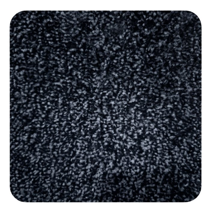 Close-up texture of dark charcoal carpet with soft, plush fibers in black and gray tones